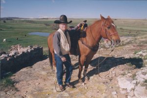 Bob Shultz with horse Gambler on Prairie Canyon Ranch